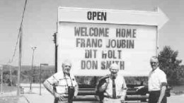 Photo by Fred MannDon Smith (left), Franc Joubin (centre) and Dit Holt gather outside the Inn on the Lake Hotel to celebrate Elliot Lake's 40th anniversary in 1994.