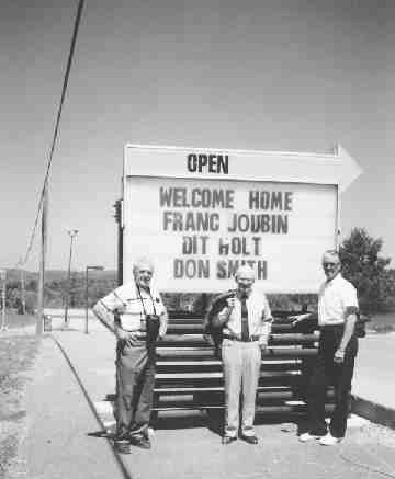 Photo by Fred MannDon Smith (left), Franc Joubin (centre) and Dit Holt gather outside the Inn on the Lake Hotel to celebrate Elliot Lake's 40th anniversary in 1994.