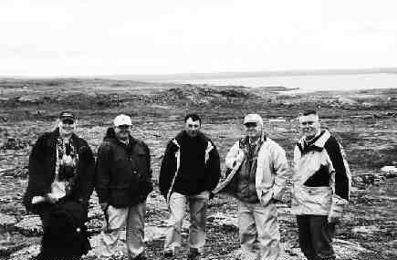 Gathered at the East Zone gossan (from left to right) are DIAND District Geologist Jurate Gertzhein, analysts Craig Miller and Gerald Rayner, consulting geologist Nick Carter and Starfield President Glen Indra.