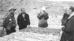 Geological consultants Richard Roy and Antoine Fournier (left to right), analyst Jacques Wortman, Dallas Davis of Twin Mining, and analyst Glen Brown examine core from Cargo I.