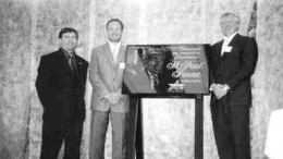 Mine manager Paul-Henri Girard (left), CEO Sean Boyd and COO Ebe Scherkus pose alongside a plaque honouring Paul Penna, founder of Agnico-Eagle Mines. It was unveiled during the recent inauguration of a new shaft at LaRonde.