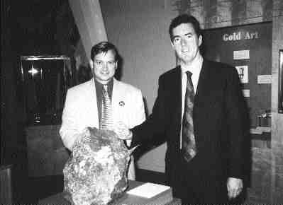 Donald MacInnes, president of the B.C. and Yukon Chamber of Mines, left, stands beside Ross Beaty, president of the Pacific Mineral Museum Society, at the museum's $5-million gold exhibition in Vancouver. The front display contains an ore sample from Barrick Gold's Meikle mine in Nevada. If visitors guess the gold content in the sample, they will win that amount in Canadian dollars. The exhibition runs until Nov. 4.