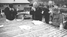 Linda Dandy, project geologist for Sultan Minerals at its Kena project in southern British Columbia, displays recently drilled core to analysts.