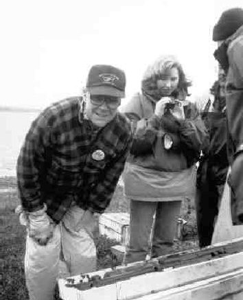 Gren Thomas, shown here in a 1995 photograph with daughter Eira, examines core from the A-418 kimberlite pipe at the Diavik property.