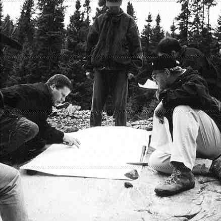 Anglo American Platinum, the Western World's largest platinum miner, and partner Pacific North West Capital are among the most active explorers for platinum group metals in the Sudbury region. Above, consultant geologist Scott Jobin-Bevans (left), who manages the pair's River Valley project, refers to a geological map during a site visit.