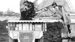 Bitumen is loaded into a mammoth truck at the Muskeg River mine in northern Alberta.