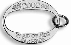 The "O" Charm, based on Oprah Winfrey's trademark O, is a 9-carat gold pendant designed to raise money for the fight against AIDS.