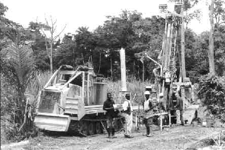 Drilling at the Ntotoroso property in Ghana's Sefwi belt. At far right, Moydow President Brian Kiernan.