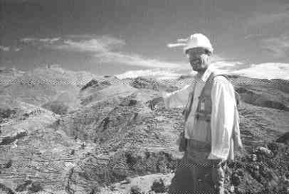 Ian Foreman, Andean America's exploration manager, points to the Virundo Dome structure at the Santa Rosa property in Peru.