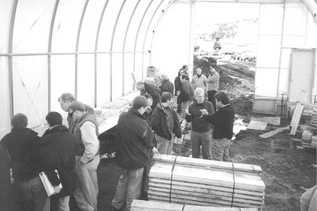 Photo by Rob RobertsonAnalysts and Miramar personnel gather in a core shack at the Hope Bay project in Nunavut.