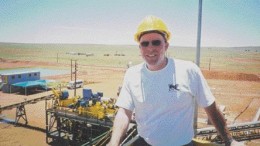 Photo by Stuart McDougallKevin MacNeil, director of project development, stands on the grizzly control tower during the opening of Etruscan's processing plant at the Tirisano diamond mine in South Africa.