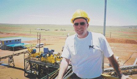 Photo by Stuart McDougallKevin MacNeil, director of project development, stands on the grizzly control tower during the opening of Etruscan's processing plant at the Tirisano diamond mine in South Africa.