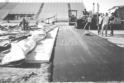 The concrete on the left is the burnout box at the beginning of the quarter-mile drag strip at the Brainerd International Raceway in north-central Minnesota. Asphalt, containing taconite, connected the new concrete track near the starting line. It also extends the track from the 750-ft. mark, where the concrete ends.