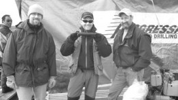 At the Churchill project in Nunavut, Sean Hawkes (left, in front), a first-aid attendant with 1984 Enterprises, stands beside Chris Raffle, a geologist with Texas-based APEX Geoscience, and Robert Woodhead, a pilot with Great Slave Helicopters.