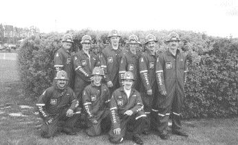 The rescue team from Cambior's Mouska mine: Back row, from left: Serge Riendeau, Donald Dziel, Serge Landry, Ghislain Lafond, Jacques Morin, Marc Blisle. Front row, from left: Marc Ct, ric Devin, Daniel Ct.