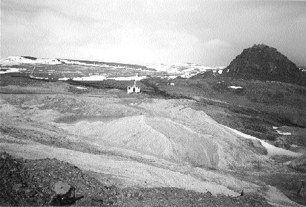 Two drill rigs (centre and far left) turn on Bema Gold's Kupol property.