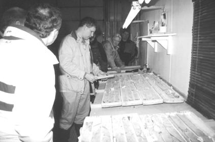 Pacific Northwest Capital's vice-president of exploration, Scott Jobin-Bevans, examines core taken earlier from the Dana Lake zone.