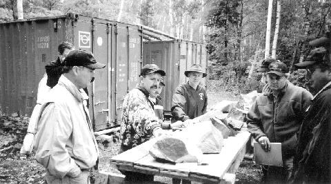 Photo by Stuart McDougallHarold Tracanelli, project geologist for Ursa Major Minerals, and President Richard Sutcliffe (front-left) run through a cross-section of the new Shakespeare deposit near Sudbury, Ont.