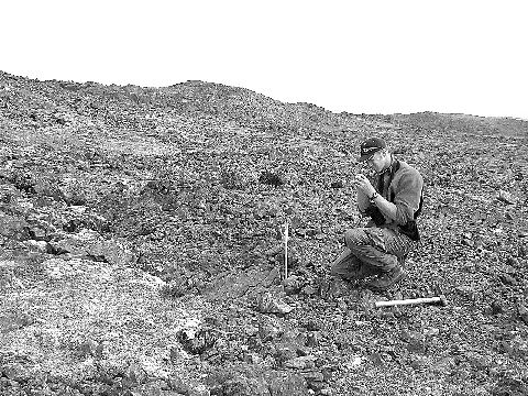 Anglo American geologist Dan MacNeil examines the Discovery gossan at the Frontier South property in far-northern Quebec.