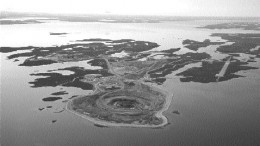 An aerial view of the Diavik mine located on a 20-sq.-km island in Lac de Gras in the Northwest Territories. Diamond-rich ore is mined from the A-154 South pipe (centre) and trucked to the processing plant situated in the upper left of the photo.