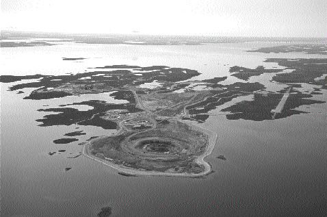 An aerial view of the Diavik mine located on a 20-sq.-km island in Lac de Gras in the Northwest Territories. Diamond-rich ore is mined from the A-154 South pipe (centre) and trucked to the processing plant situated in the upper left of the photo.