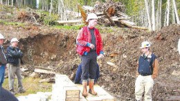 Pat McAndless, Imperial Metals' vice-president of exploration (centre), and Biran Kynoch, president (right), at the Northeast zone drill site, part of the Mount Polley project in central British Columbia.