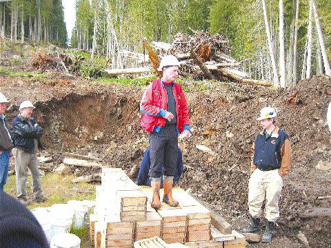 Pat McAndless, Imperial Metals' vice-president of exploration (centre), and Biran Kynoch, president (right), at the Northeast zone drill site, part of the Mount Polley project in central British Columbia.