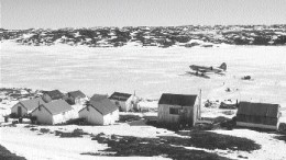 A plane carries supplies and personnel to Wolfden Resources' High Lake camp in Nunavut.