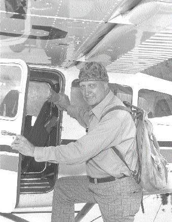 Lew Parres boards a float plane in northern Manitoba.