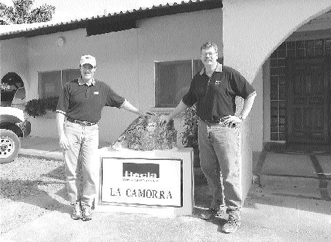 From left to right: Phillips Baker Jr., president of Hecla Mining and Thomas Fudge Jr., vice-president of operations and president of Hecla Venezuela, stand by ore displayed at Hecla's La Camorra mine.