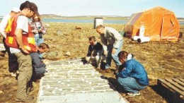 Canadian Royalties project geologist Todd Keast (third from right) examines core from the Mequillon nickel-copper deposit in the Ungava peninsula.