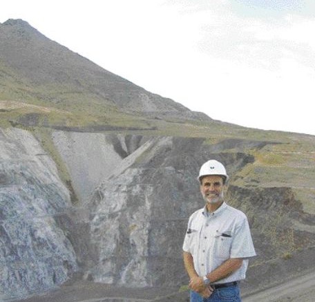 Atna Resources President and CEO David Watkins stands in front of the CX pit, part of the Pinson gold project in Nevada's Getchell gold belt. Recent drilling by Atna confirmed the high-grade nature of the principal feeder structures beneath the CX pit.