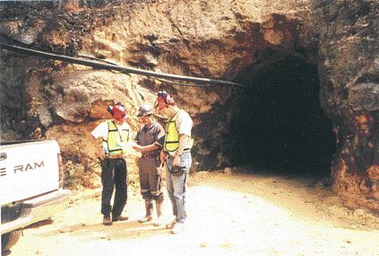 From left: Genco President Jim McDonald, Chief Geologist Jesus Perez, and financier Robert Blankstein examine a map near a portal at Genco's La Guitarra silver-gold mine in the Temascaltepec mining district of Mexico.