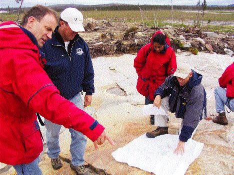 Photo by Rob RobertsonFrom left: Virginia Gold Mines President and CEO Andr Gaumond; Canaccord Capital analyst Graeme Currie; an unidentified research associate; and Virginia's Vice-President of Exploration Paul Archer on the company's lonore gold discovery in the James Bay region of Quebec.