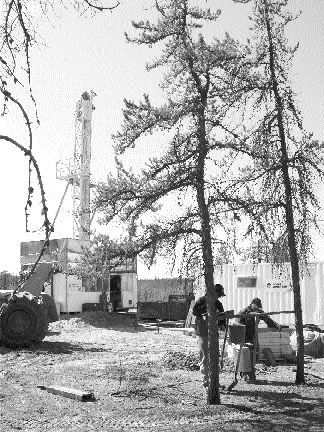 A drill rig tests the Shea Creek uranium project in the Athabasca basin in northern Saskatchewan where a recent 3.5-metre interval averaged 58.3% U3O8. The project is jointly held by Cogema and UEX.