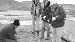 Photo by Stephen StakiwFrom left: Galileo Equities mining analyst Glenn Brown, Western Prospector Consulting Geologist Gerald Harper, Haywood Securities analyst Jim Mustard and Western Prospector Geologist Wilfried Meyer examine high-grade uranium core from Saddle Hills hole 5006.