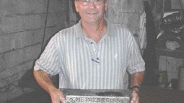 Bruce Bried, Endeavour Silver's vice-president of mining, holds a dor bar from the company's Santa Cruz silver mine in Mexico.