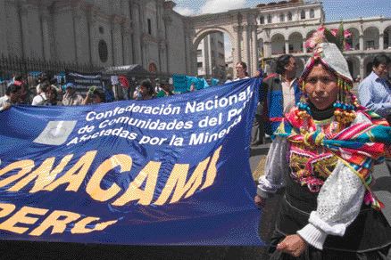 Photo by Leticia LozanoPeruvian peasants demonstrate against mining companies during the final day of a global industry conference in Arequipa, Peru. The protesters claim that mining is polluting water supplies and damaging farmland.