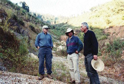 Standing at the northeasternmost end of the 40-km-long Luxi gold belt, from left: Lee Barker, president and CEO of Sparton Resources; geologist Guojian Xu; and geologist Guy Della Valle. Says Della Valle of Yunnan province: "Compared to Angola, working here is like being on holiday."