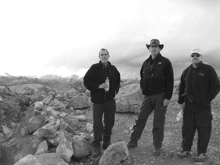 Photo by Rob RobertsonAtop a ridge at Bear Creek Mining's Corani silver-zinc project in Peru. From left: Bear Creek Mining president and CEO Andrew Swarthout, Bear Creek's vice-president of exploration David Volkert, and newsletter writer David Coffin of the Hard Rock Analyst Journal.