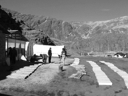 The base camp at the Corani silver-zinc project in Peru. Bear Creek Mining's geological team lays out drill core for evaluation.