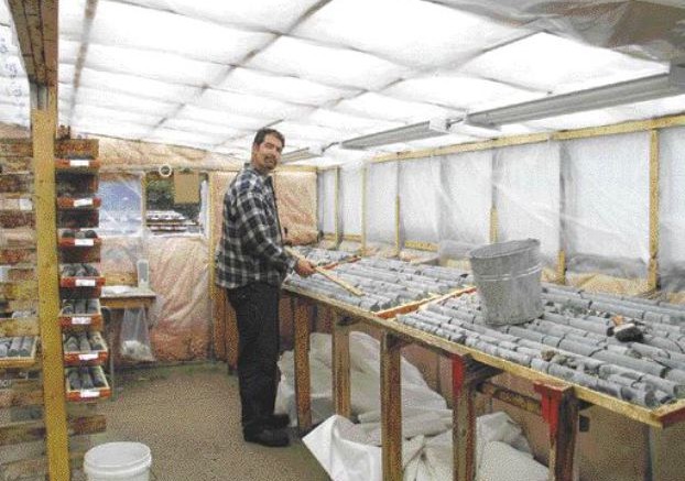 Wolfden Resources geologist Greg Duso logs core in the core shack at the High Lake project in Nunavut.