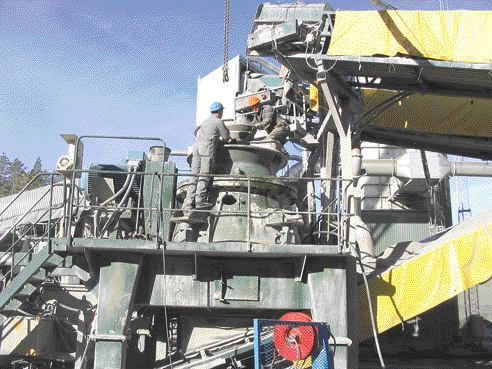 Employees repair the crushing area of the Bjorkdal mill.