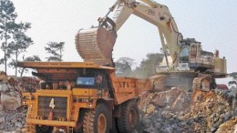 A large haul truck is filled with ore at Red Back Mining's Chirano gold mine in Ghana's Bibiani gold belt.