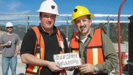 Gammon Lake CEO Brad Langille (left) and president and chairman Fred George hold a 30-kg gold dor bar from the company's first metal pour at the Ocampo gold mine in Chihuahua state, Mexico.