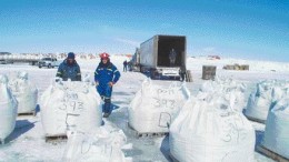 De Beers geologist Clement Rikhotso (left), and senior project manager Martin Podolsky with bulk samples from the Gahcho Ku diamond project in the Northwest Territories.