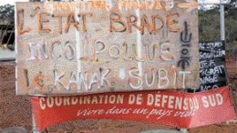 MINING WATCHThis protester's sign near the Goro nickel project in New Caledonia roughly translates to "Goro-Nickel, a cursed project. The state sells off, Inco pollutes, and Kanak people suffer." Inco, which owns Goro through its subsidiary, Goro Nickel, says protesters in the area recently committed more than $10 million in damages on the company's property.