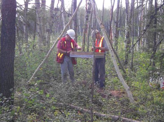 GOLDER ASSOCIATESScreening excavated soil at an oilsands property in northern Alberta.