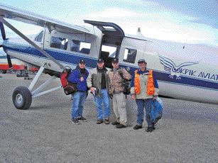 TITAN URANIUMFrom left: Titan Uranium CEO Chad Wasilenkoff, director-chairman Arni Johannson, president Philip Olson and geologist Paul Nichols (orange vest) head out from Baker Lake airport to the company's Thelon basin uranium project in Nunavut.