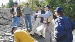 JAMES WHYTEMarathon PGM president and CEO Philip Walford displays some stripped outcrops of the Port Coldwell intrusive complex on the company's Marathon copper-palladium-platinum property north of Marathon, Ont. A preliminary economic assessment of Marathon says an open-pit operation there could be profitable at today's metal prices.